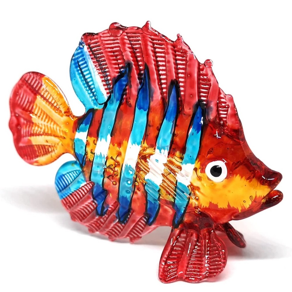 Miniature glass blown fish figurine.